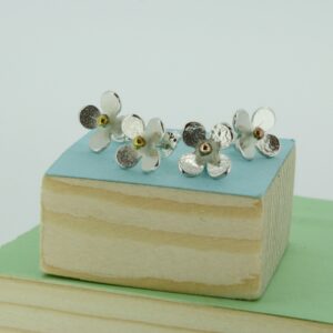 Silver daisy stud earrings