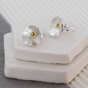 silver and gold stud earrings
