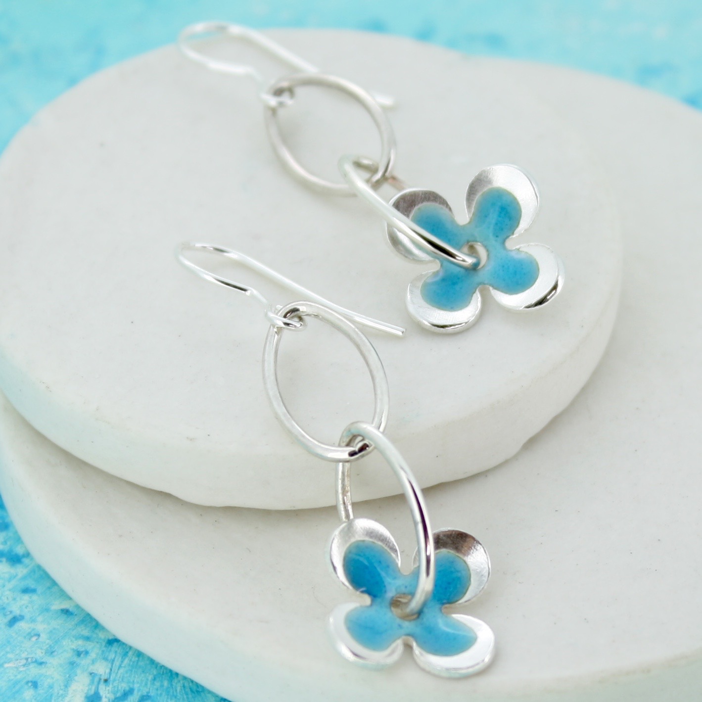 Enamelled blue flower earrings