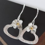 silver heart earrings with daisies