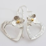 silver heart earrings with daisies