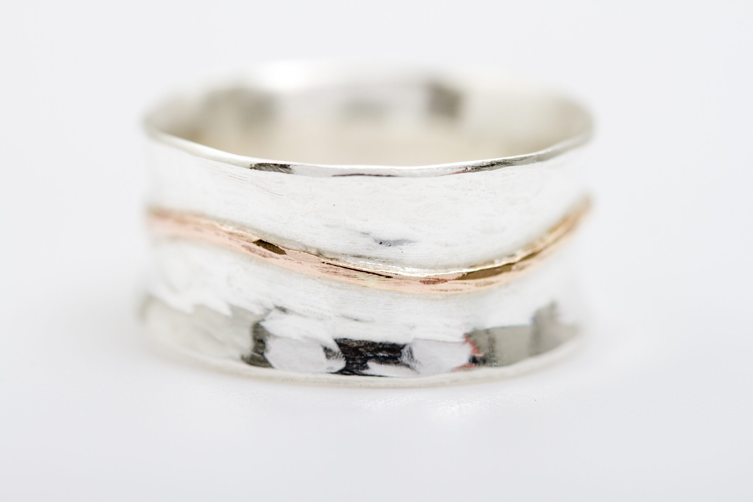 hammered silver ring with gold line