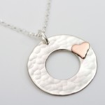 hammered silver personalised pendant with gold heart