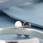 Personalised baby bangle with daisy