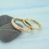 yellow gold wedding rings cast using Cornish sea sand