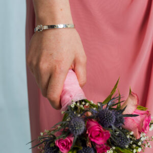 Silver bangle with daisy