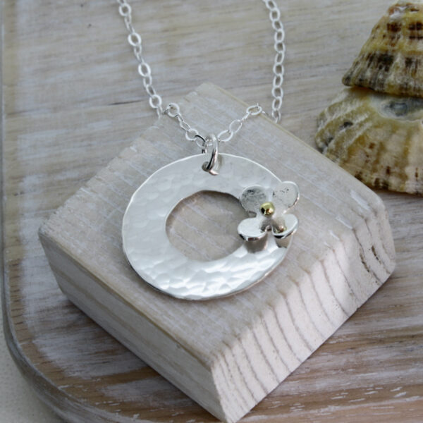 Personalised Silver disc pendant with daisy