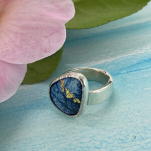 Blue enamel ring with gold detail