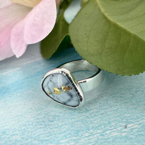 Grey and white enamel ring with gold detail
