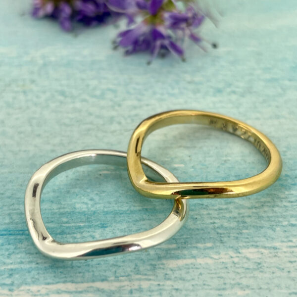 Wishbone shaped wedding ring