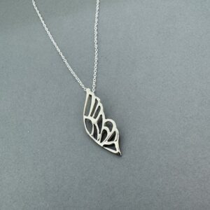 Silver angel wing pendant on 16" chain